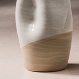Ceramic Jarra pitcher with two-tone design on a neutral background